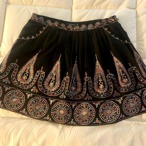Black embroidered miniskirt with pockets